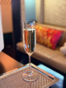 Glass of champagine in Etihad First apartment