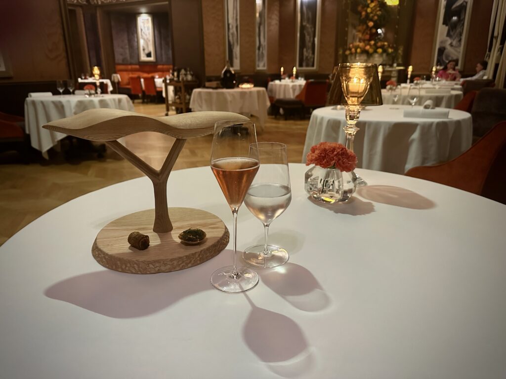 Restaurant table with glass of champagne
